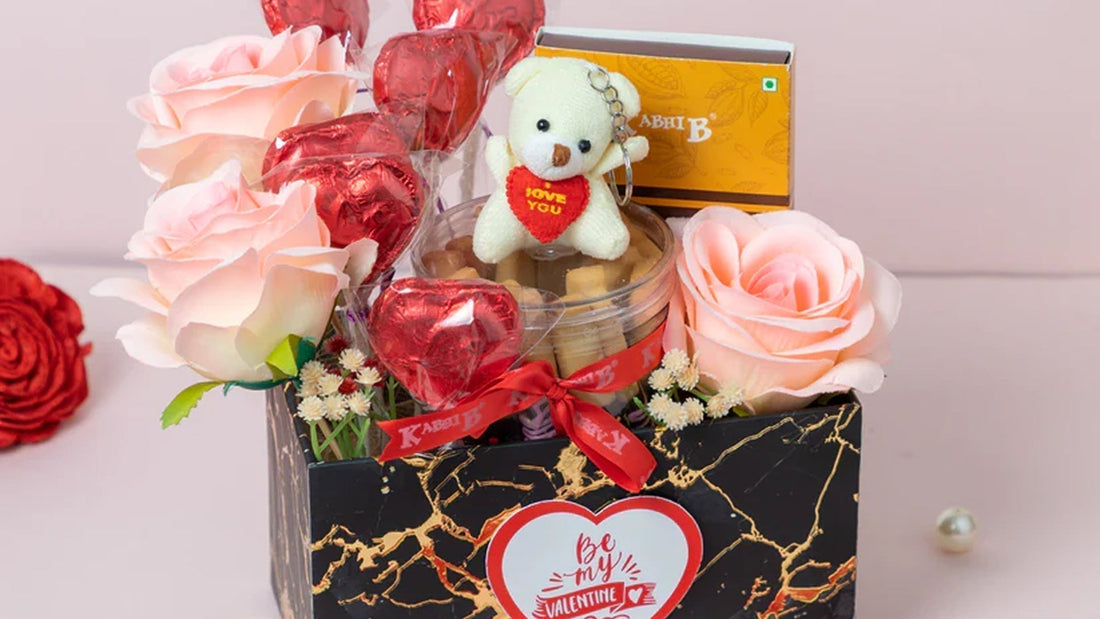 Cakes for Valentine's Day: A delightful gift box with roses, chocolates, and a teddy bear.